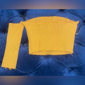 One sleeve off the shoulder top. Mustard color. Size small. Worn once.